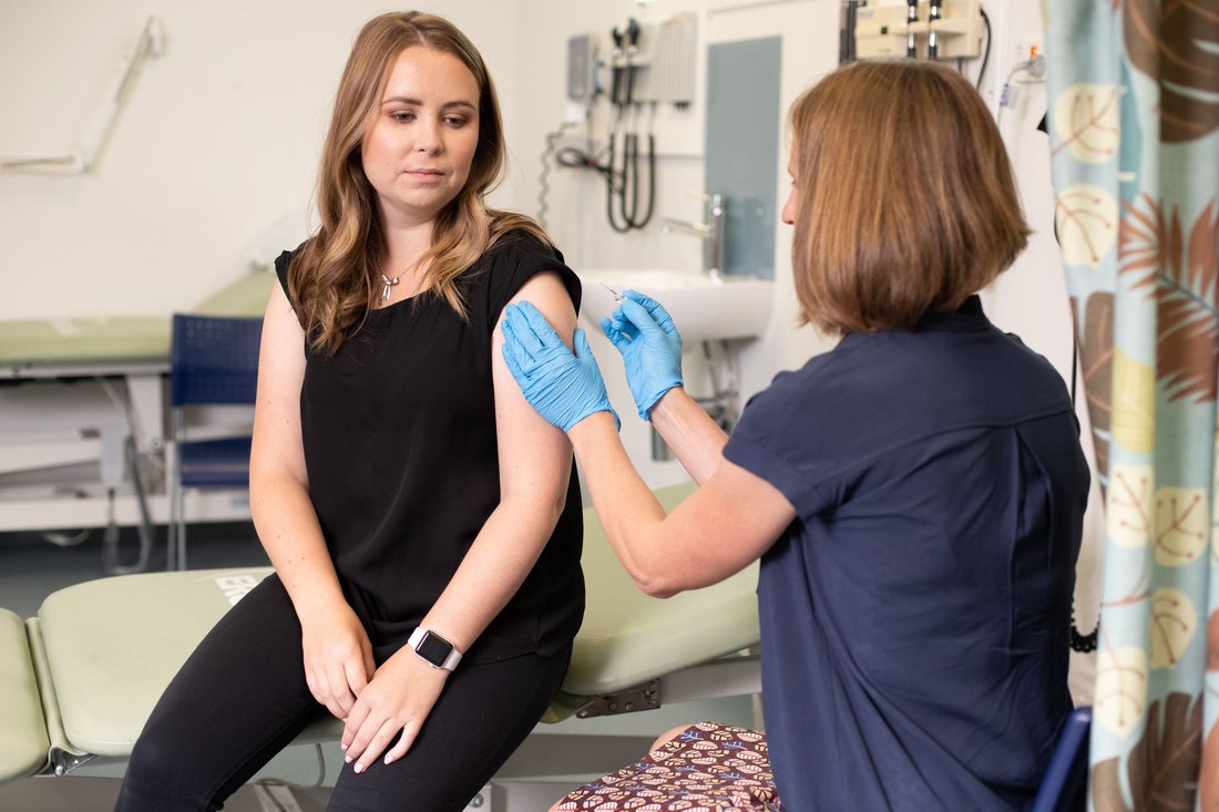 Dr gives patient a vaccine