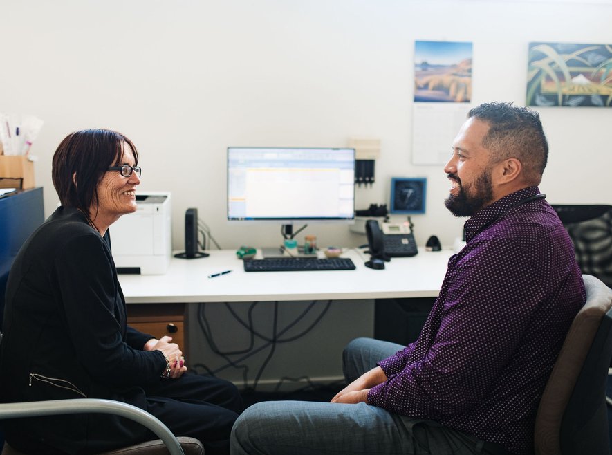 Dr Jason Tuhoe with a patient