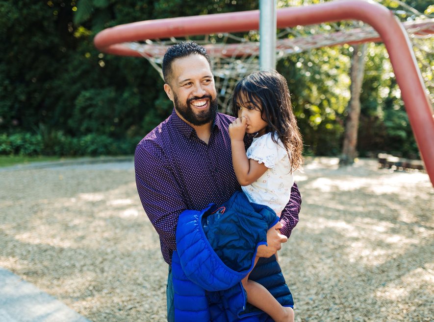 Dr Jason Tuhoe and his daughter at the playground