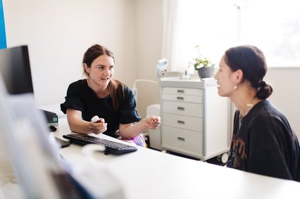 Dr Melissa-Jane Austen (left) with a patient