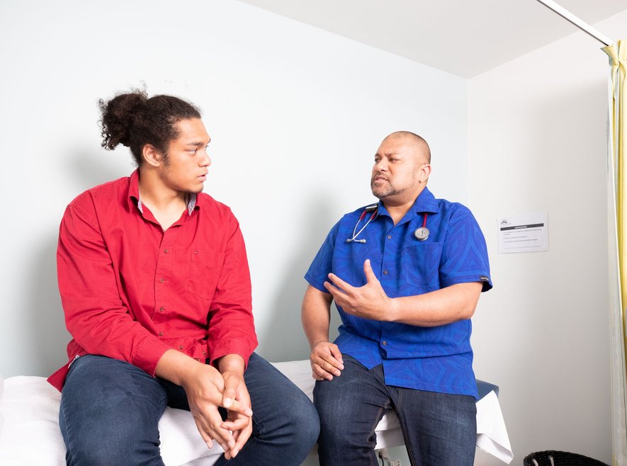 GP consults with young Pasifika man
